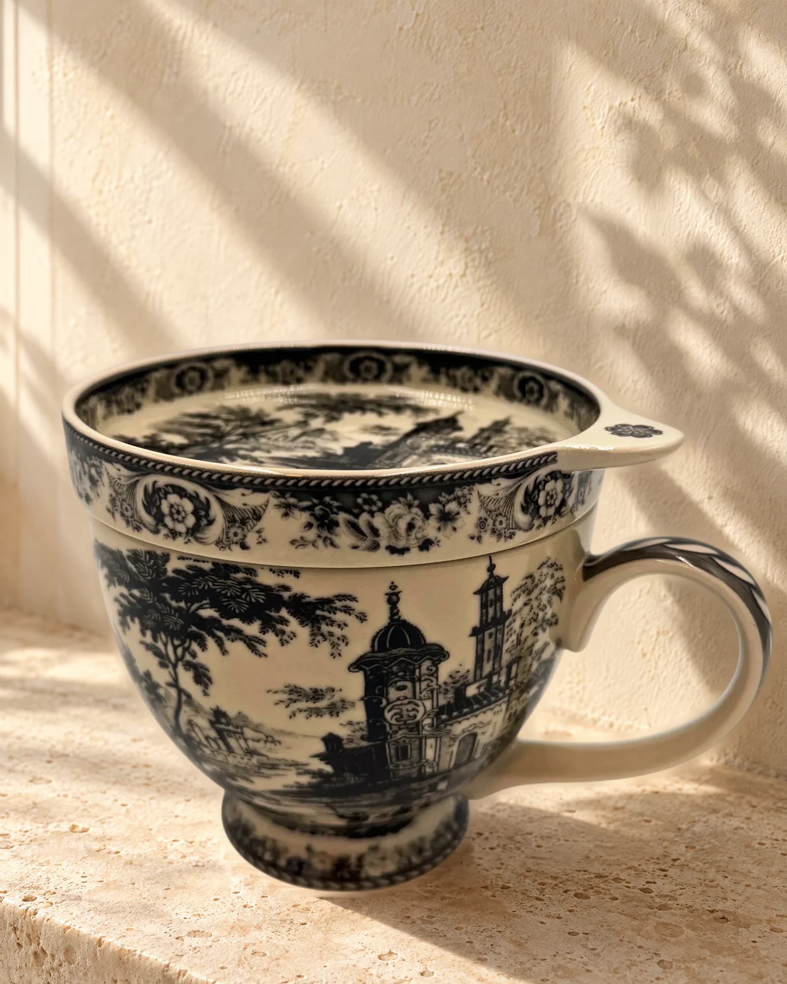 Tea cup and saucer black