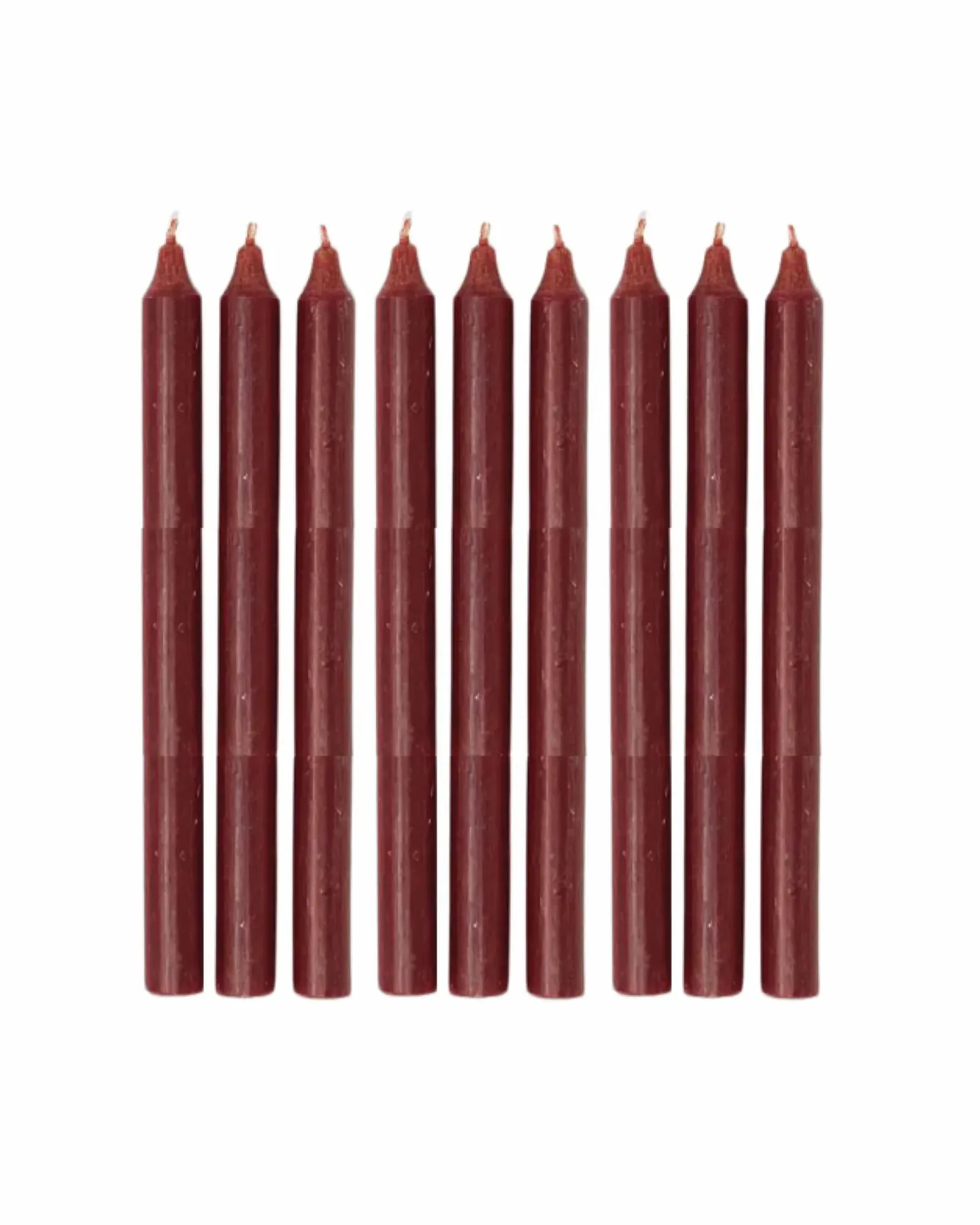 A single bordeaux dinner candle standing upright, photographed against a plain background.