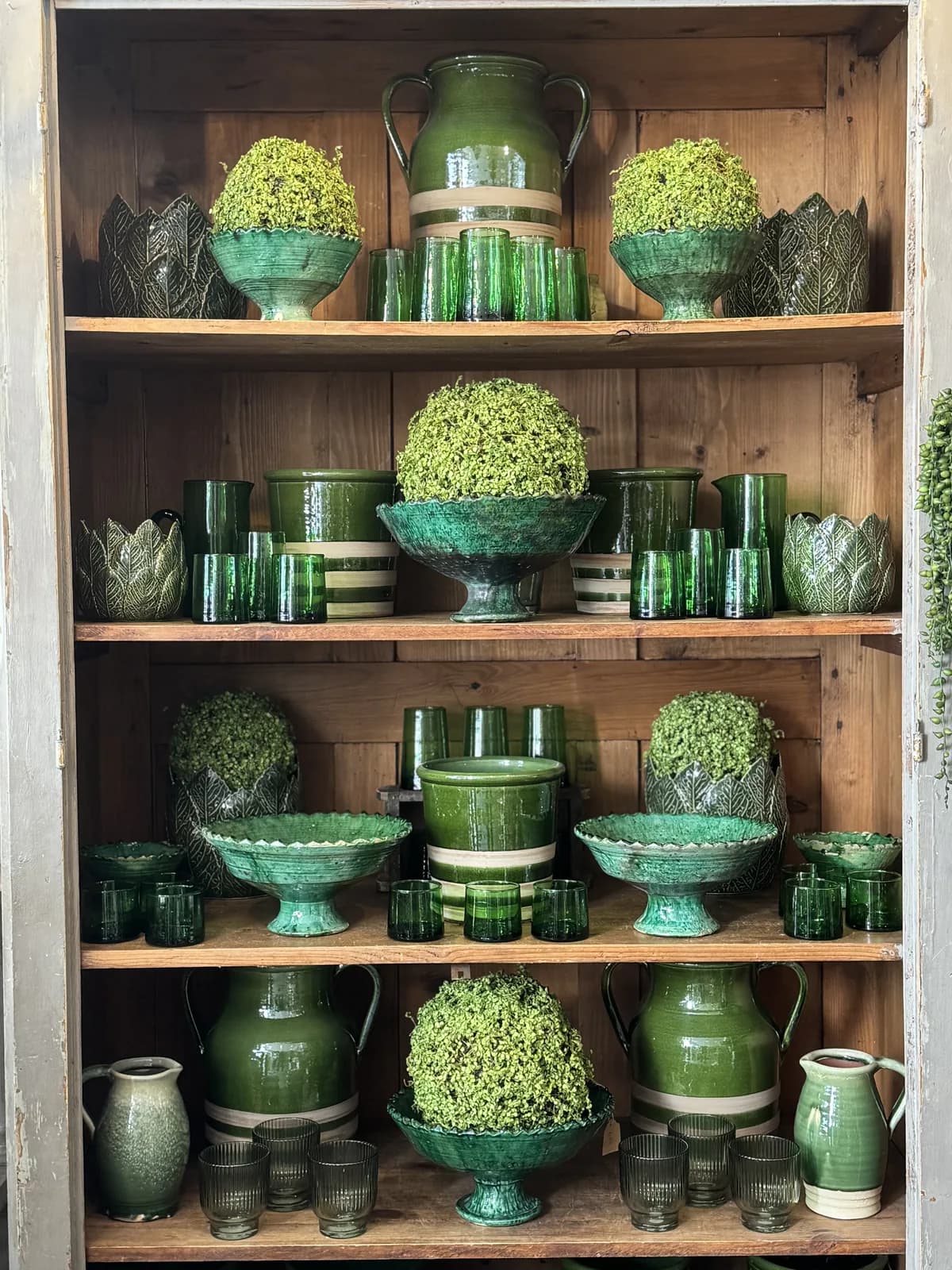 The Home & Glory shelf of homeware and candles